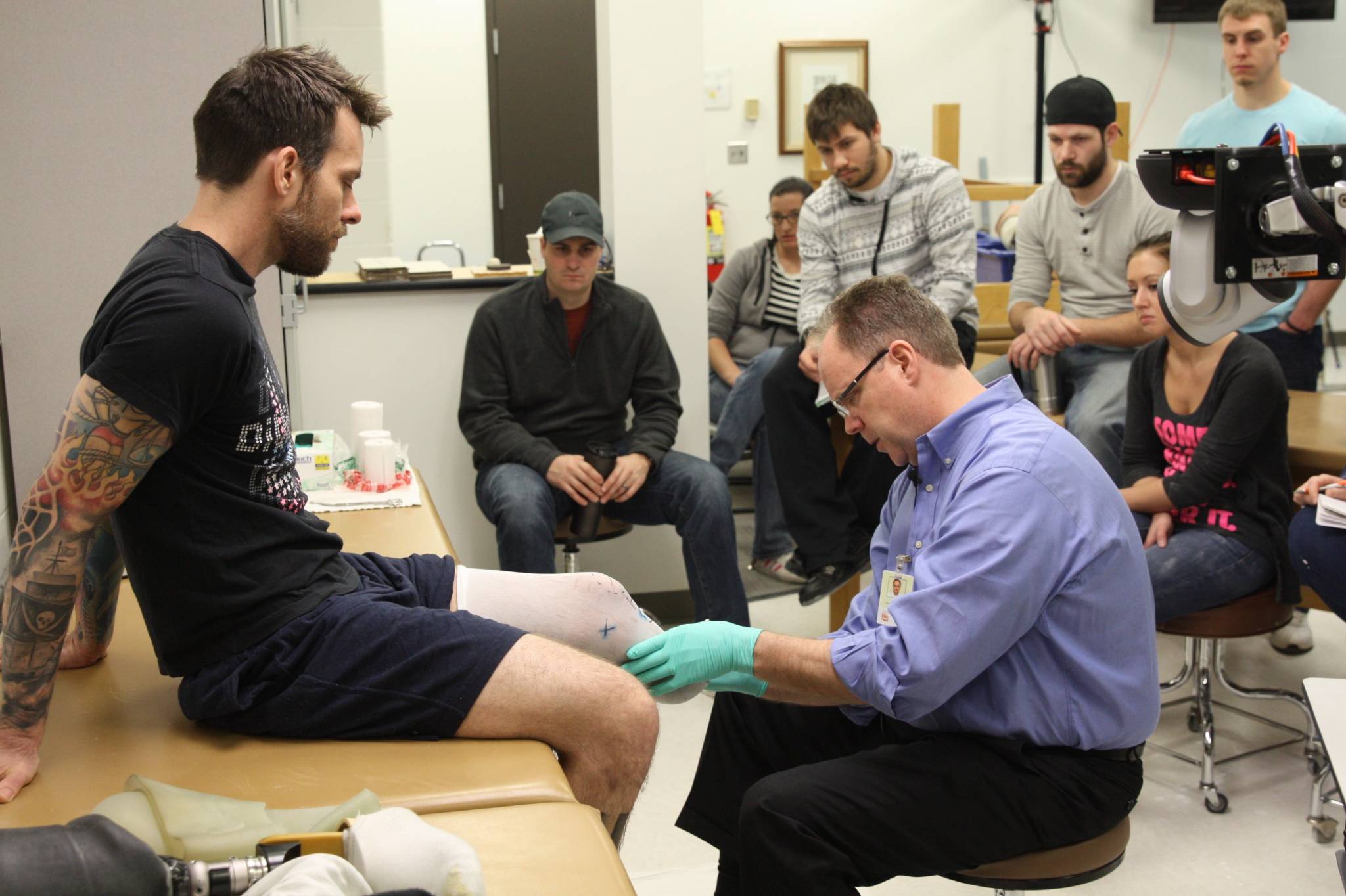 Century College Instructor Roger Wagner makes a leg prothesis mold